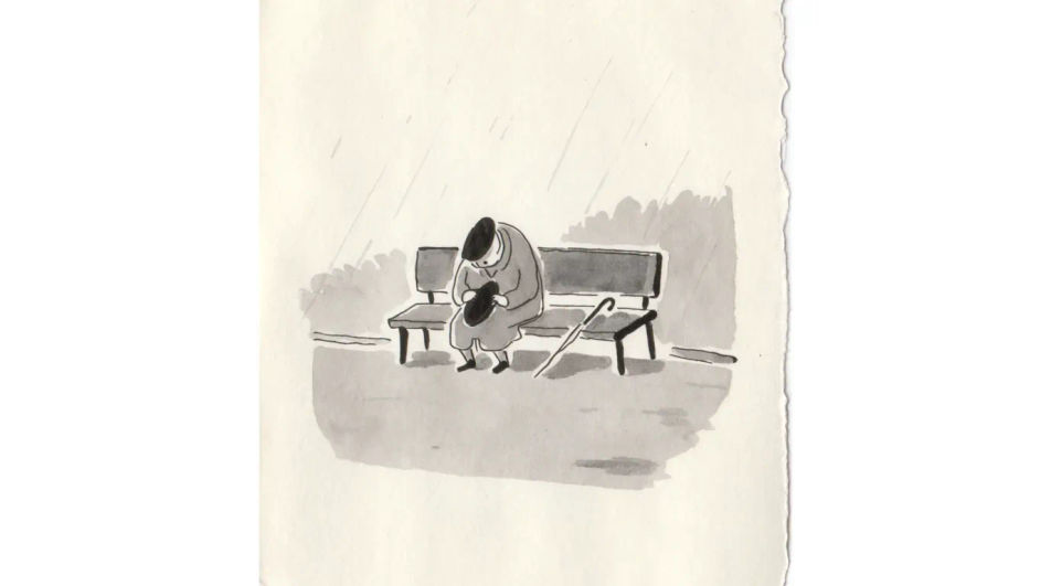 Alone on a bench in the rain