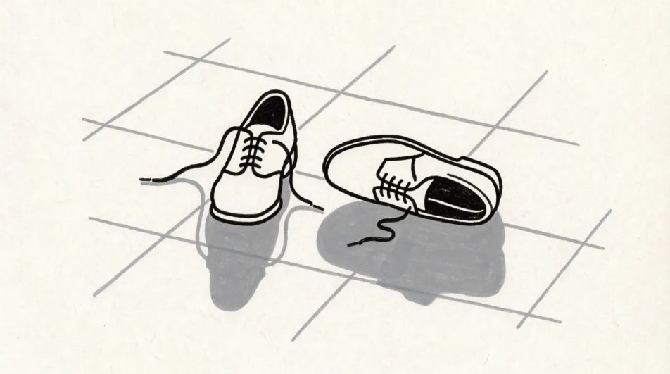 Shoes by a doorway in ink and wash