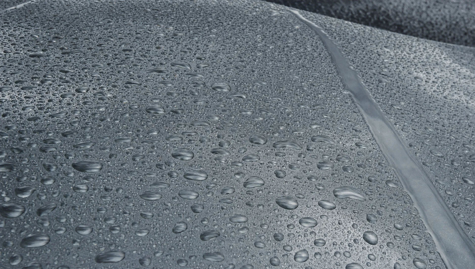 Rain-beaded car hood