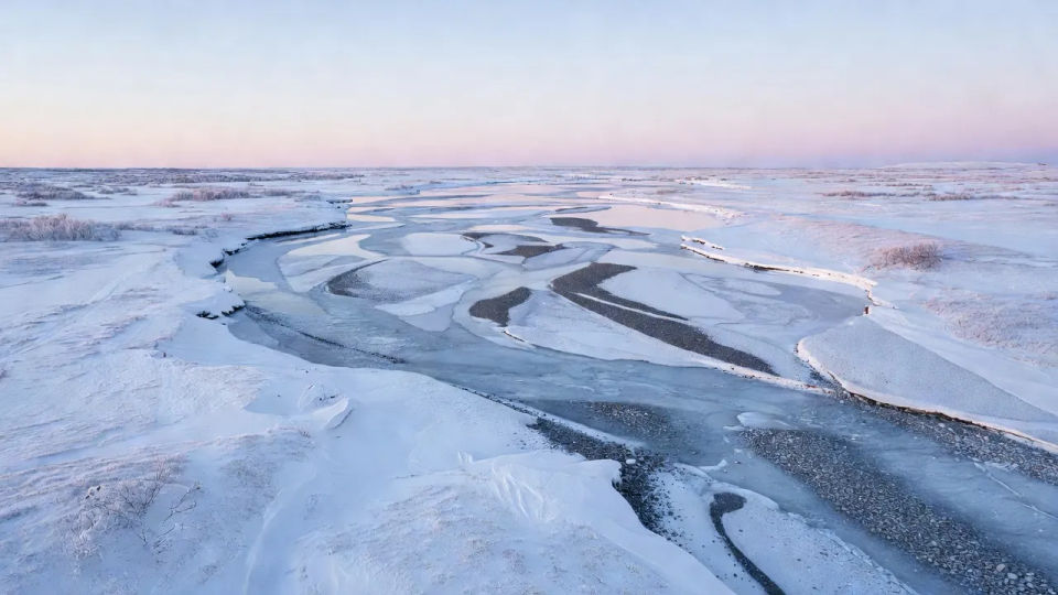Frozen valley at dawn