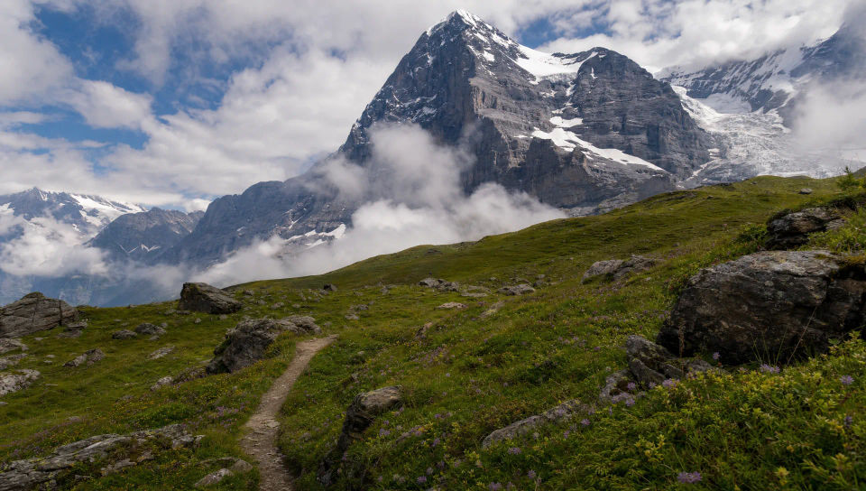 Trail leading toward a distant summit