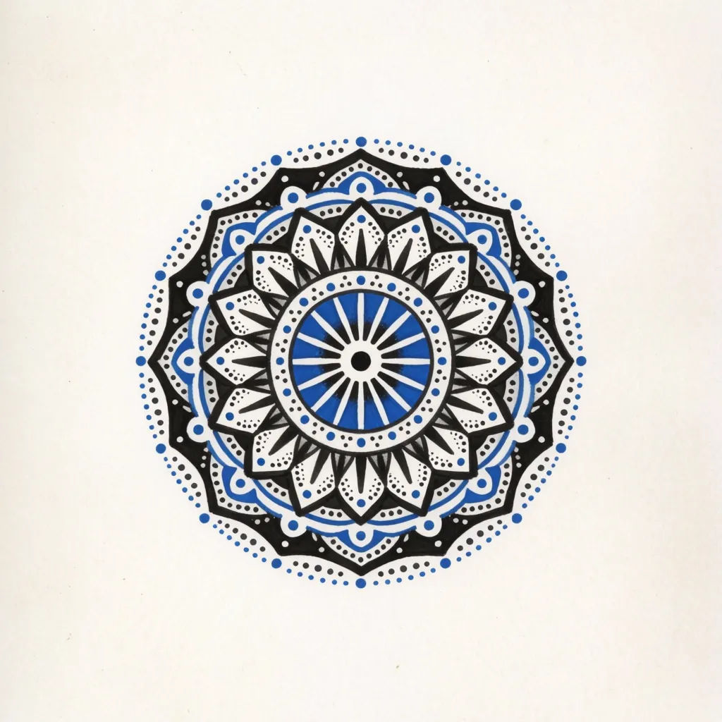 Symmetrical geometric mandala dotwork tattoo sized for a forearm