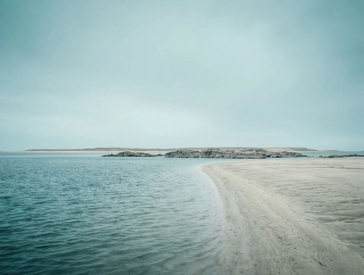 Coastal scene in teal, slate, and pale sand