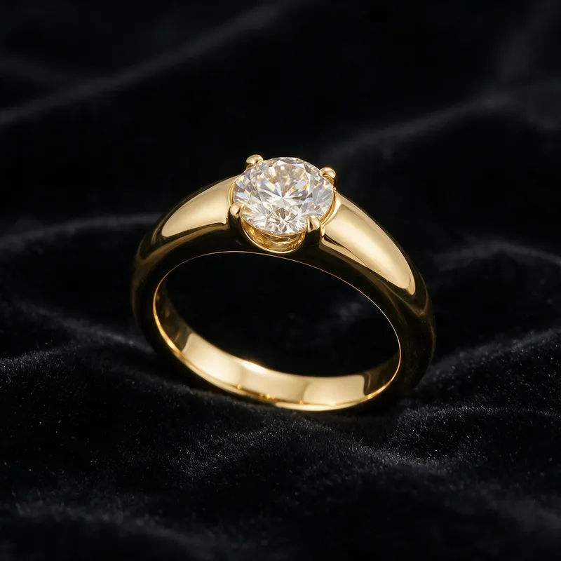 Gold solitaire ring on black velvet with soft rim light and true sparkle