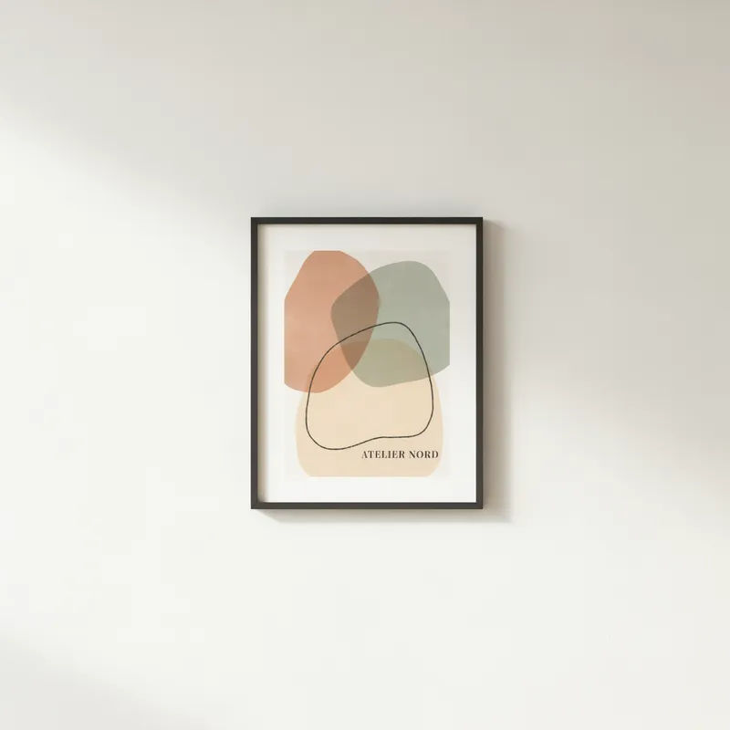 Uploaded design set in a thin black frame on a light gallery wall