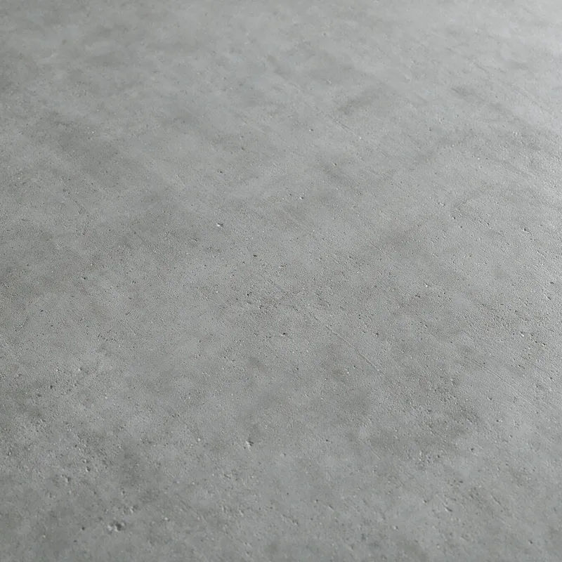 Sichtbeton mit feiner matter Körnung und zarten Schalungsspuren in kühlem Grau