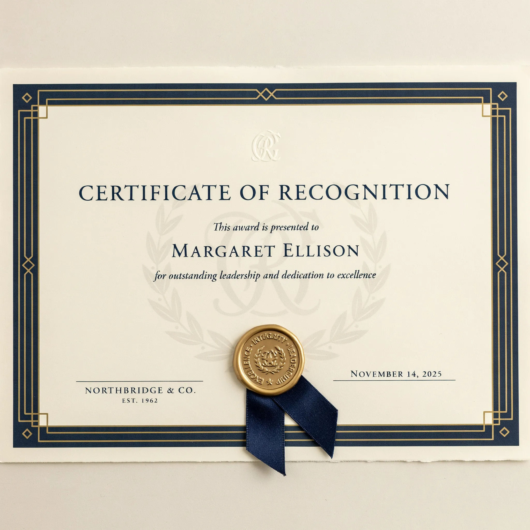 Corporate employee recognition certificate in navy and gold