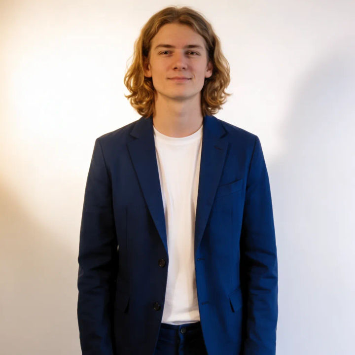 Casual t-shirt replaced with a tailored navy blazer from a reference