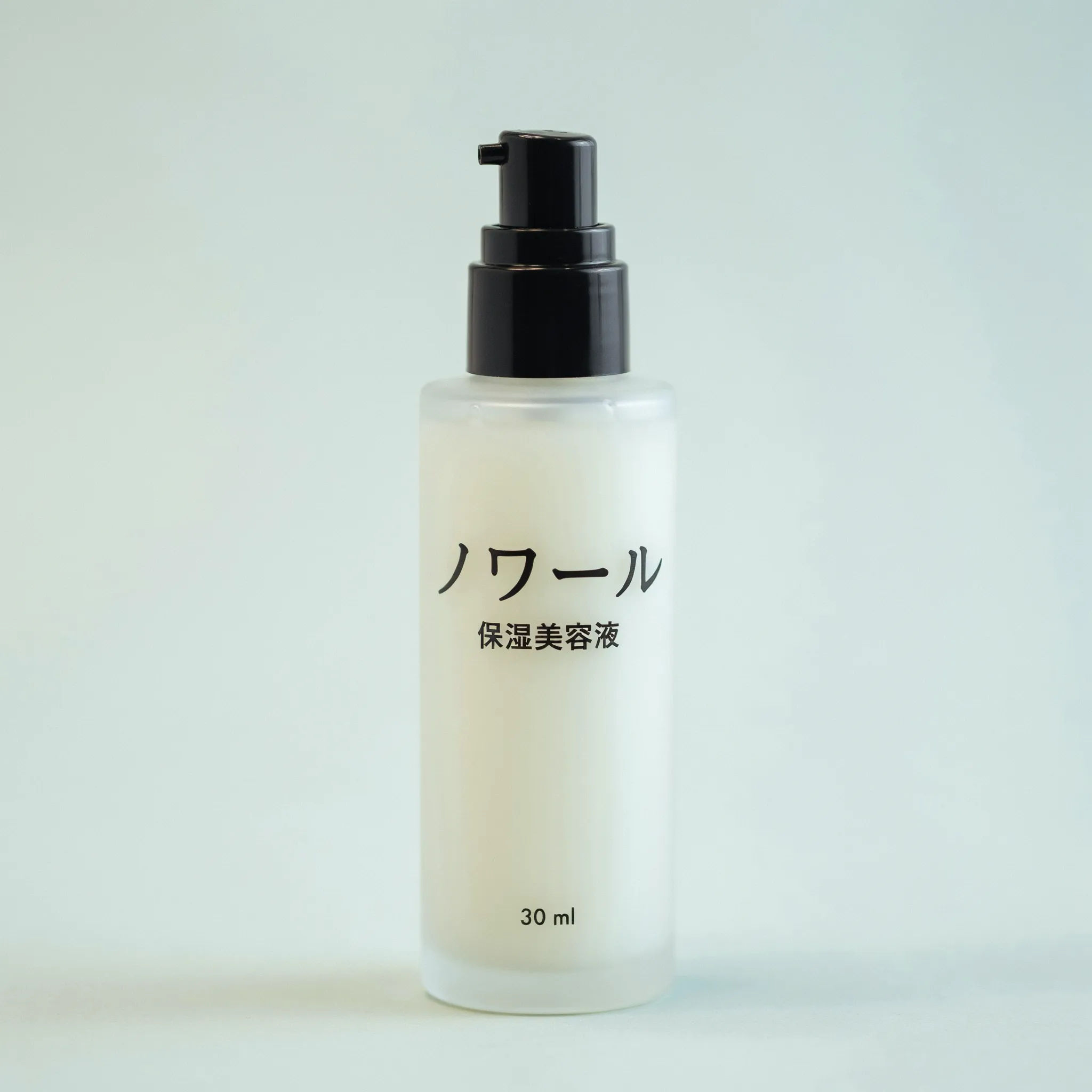 Bottle label translated into Japanese wrapped around the curved surface