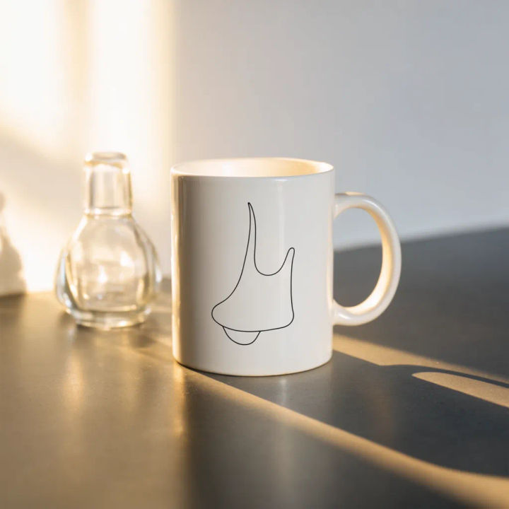 Product photo with a mug detail added inside a mask