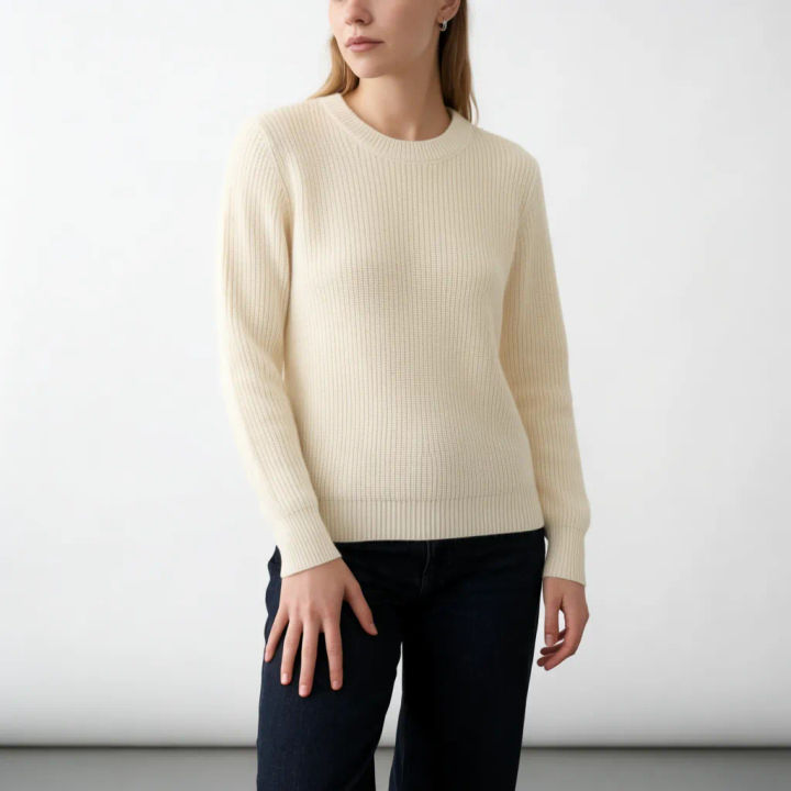 Model in a ribbed sweater matched from a product reference