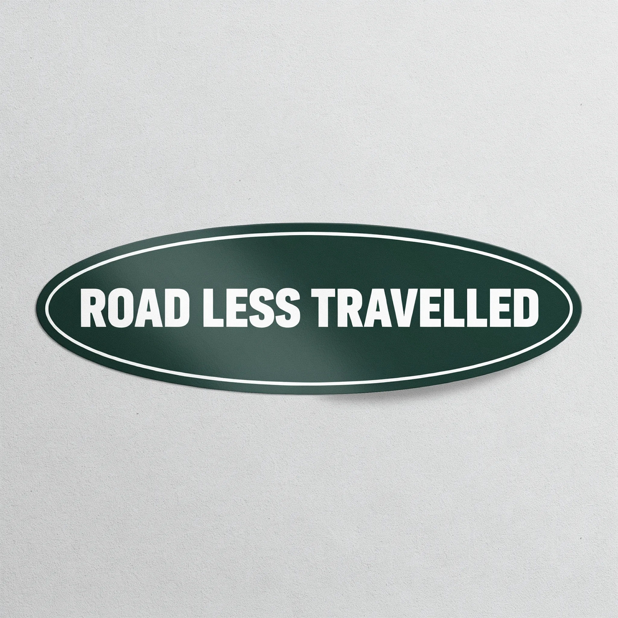 Deep green oval bumper sticker with a bold white slogan