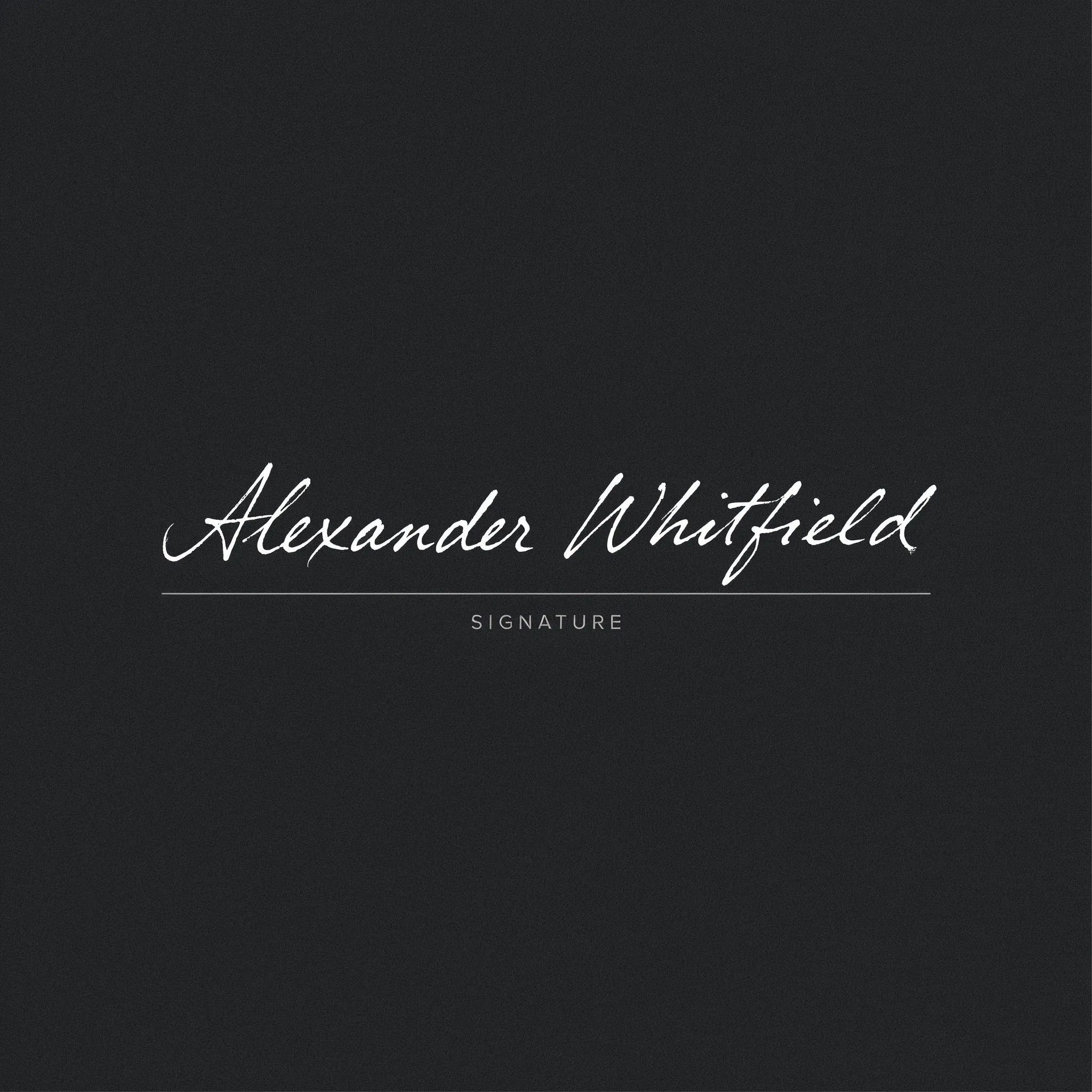 White looping cursive signature on a dark charcoal background