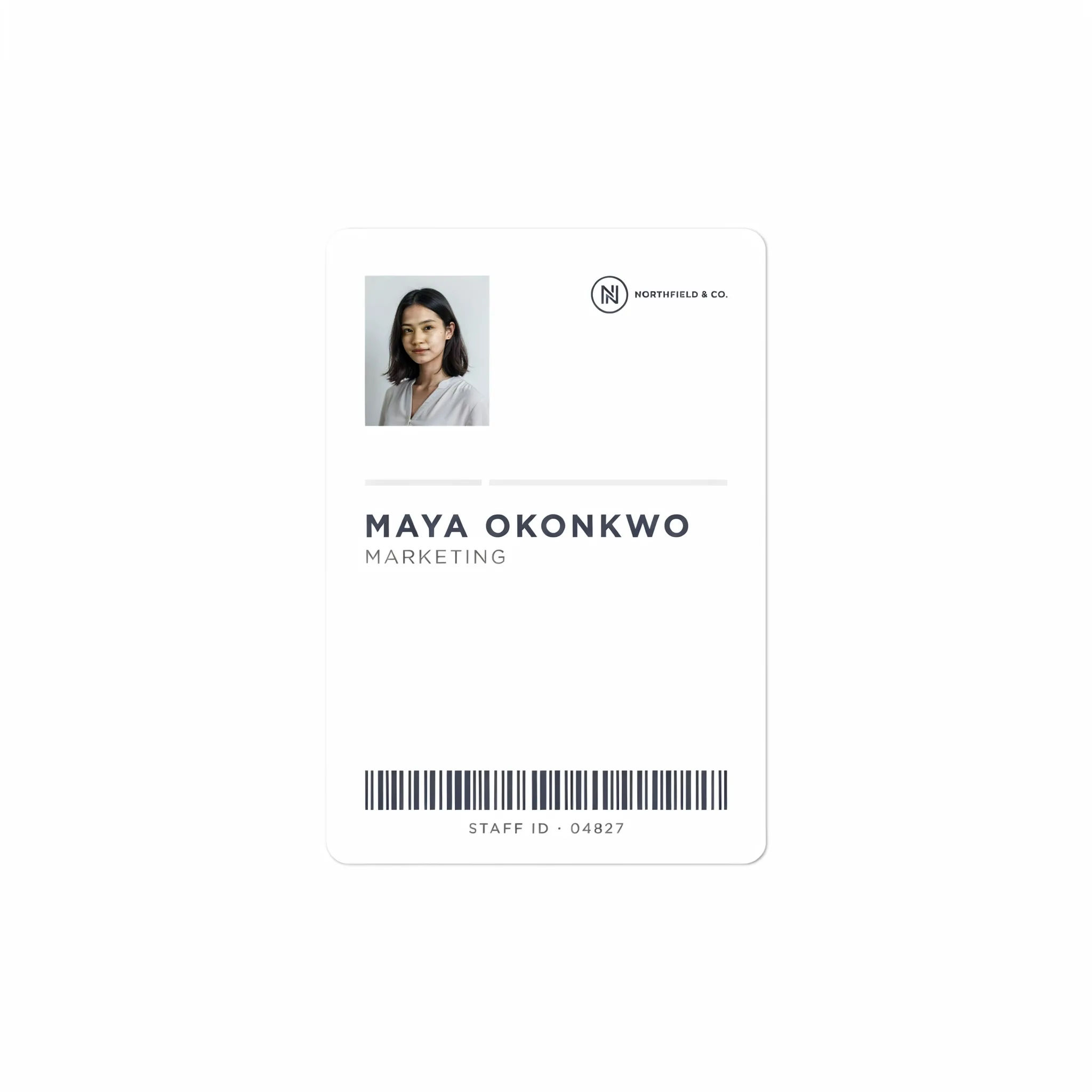 Minimal white staff ID badge with thin type and white space