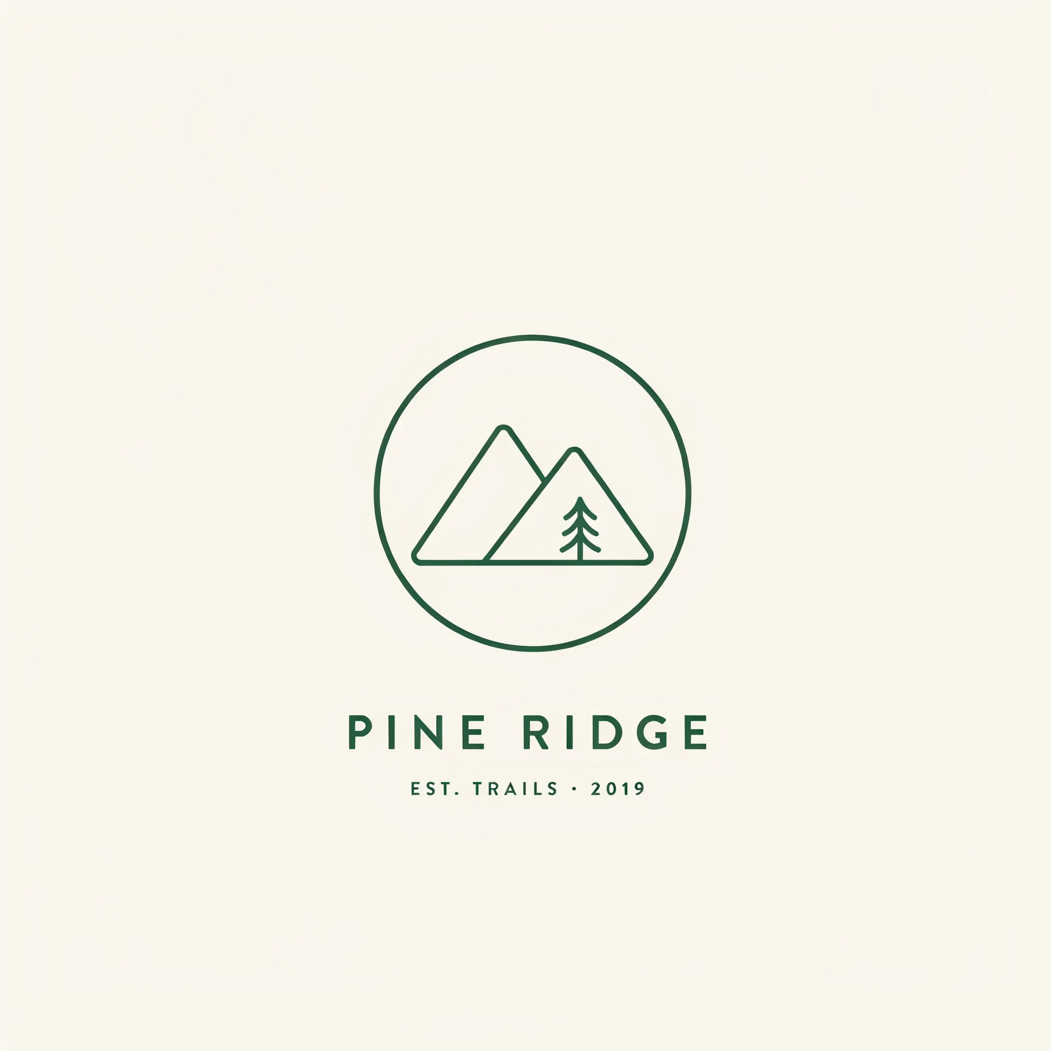 Line-art green mountain emblem inside a circle