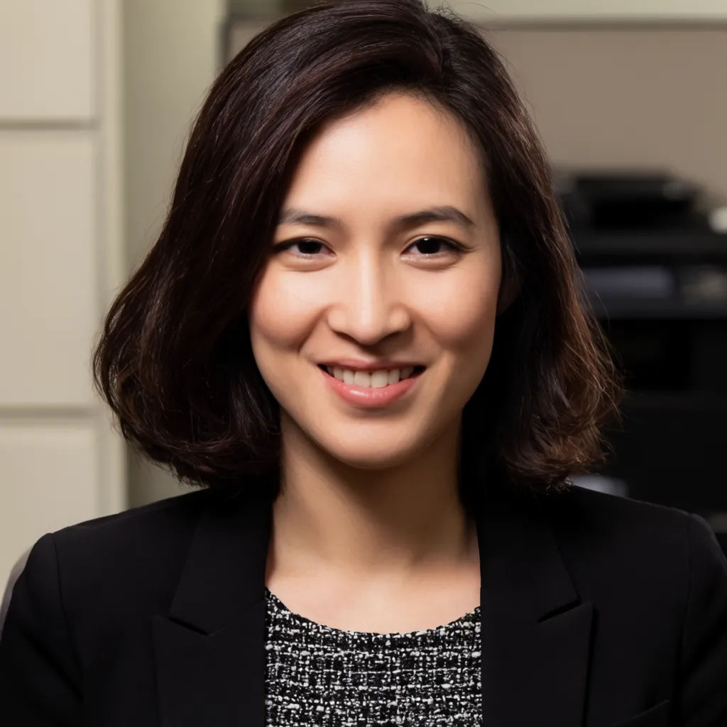 A profile photo with the subject on a softly blurred office background