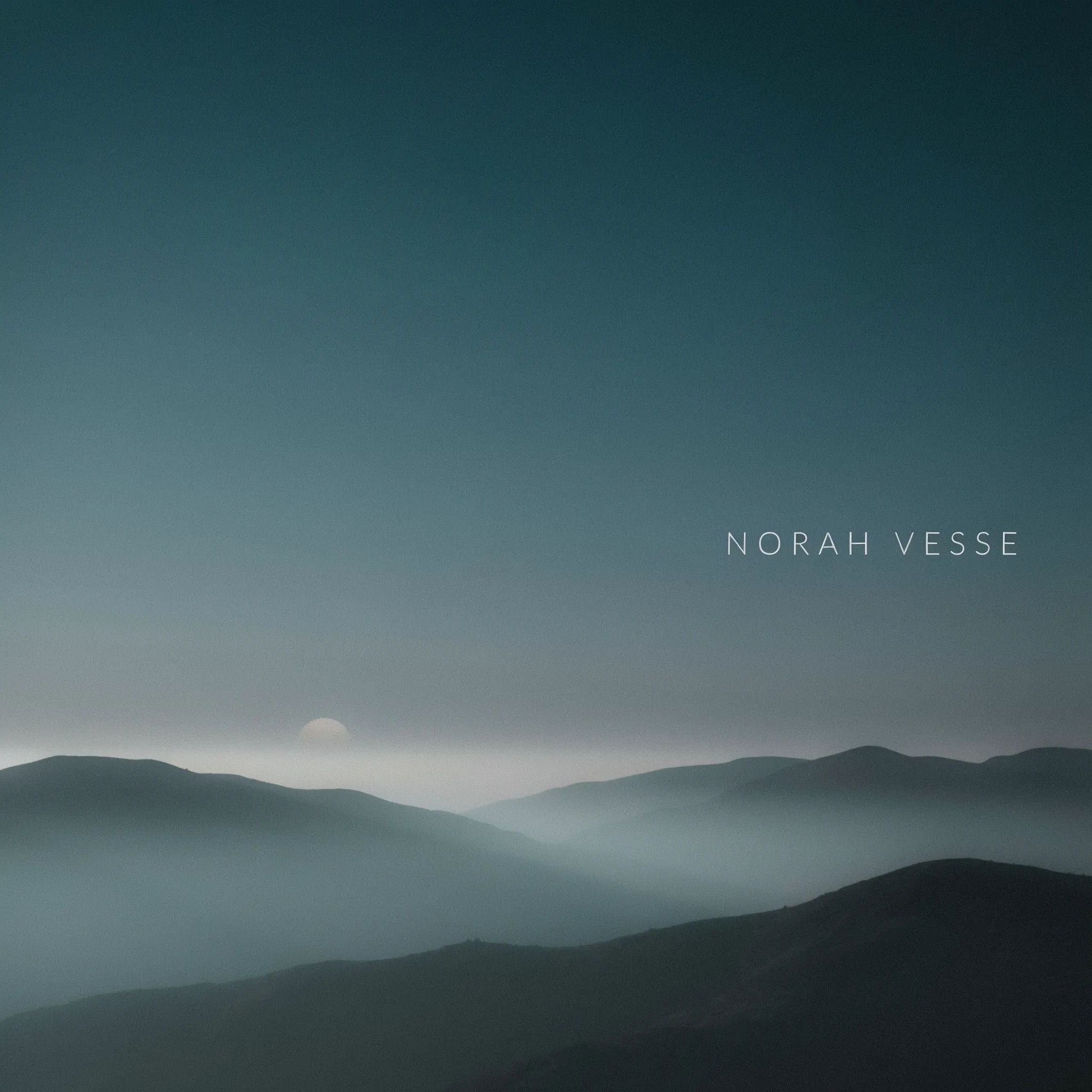 Soft teal ambient SoundCloud banner with a misty mountain silhouette