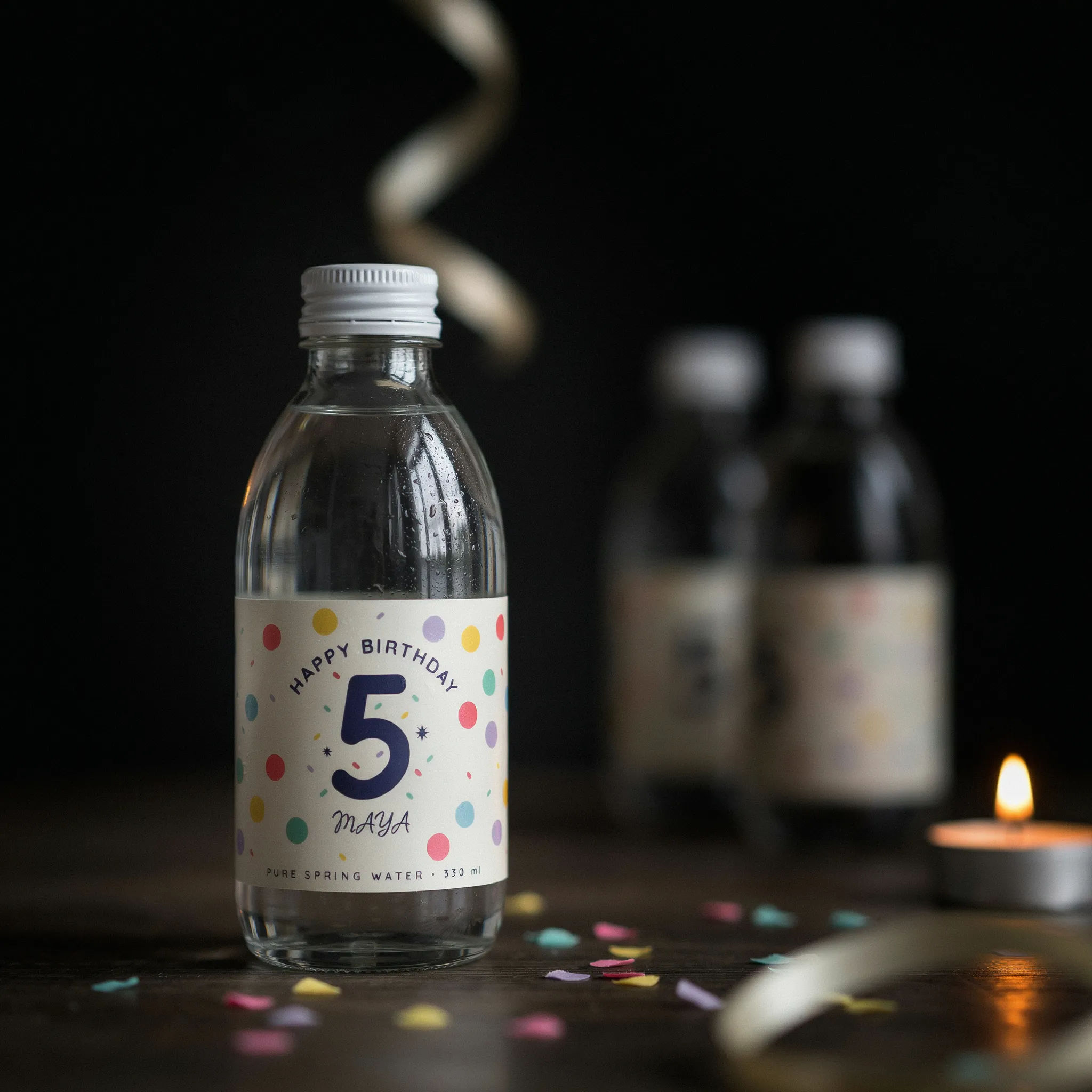 Colourful confetti birthday water bottle label with a bold number five
