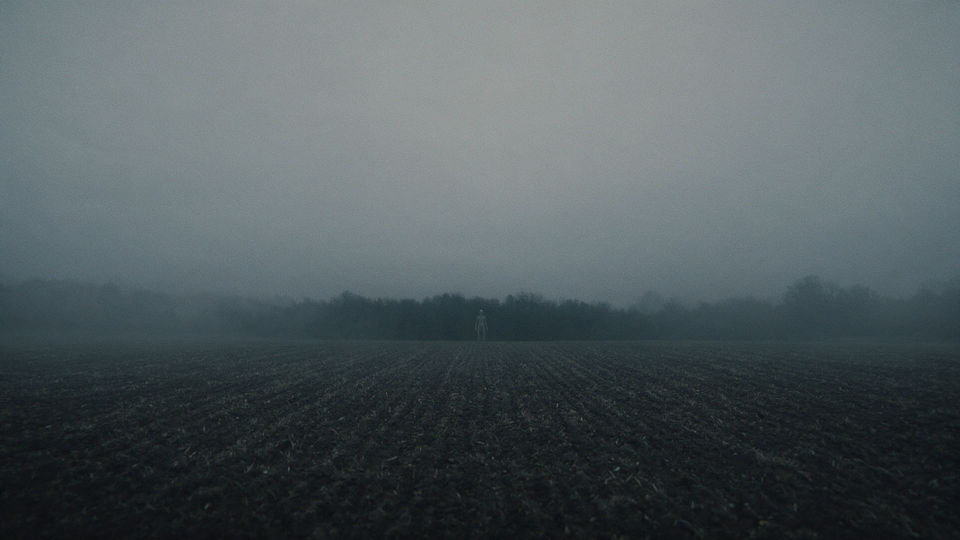 Figure at the treeline