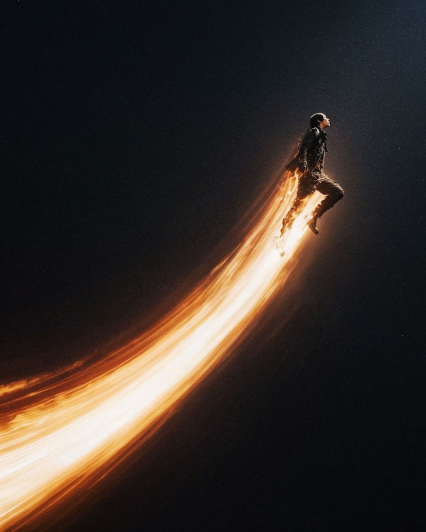 A figure climbing into the night sky trailing a long streak of blazing fire and light behind them