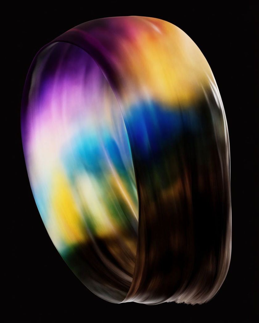 A sculptural sweep of glossy hair curving into a blunt chin-length shape against a pure black ground