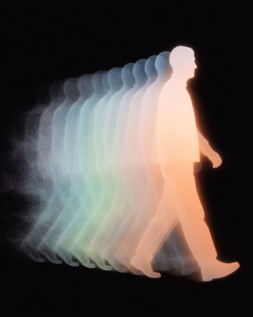 A single walking silhouette rendered in soft light with a fan of identical copies peeling on a black ground